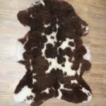 Dekorations und Sitz Fell einzigartig gescheckt (organisch)