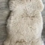 Dekorations und Sitz Fell Merino klassisch bernstein