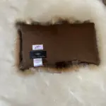 Nackenkissen aus Rotfuchs- oder Waschbärfell