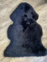 Dekorations und Sitz Fell Merino stylisch schwarz